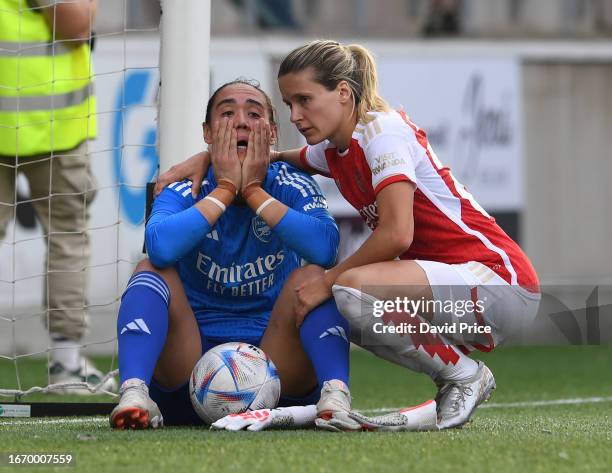 Manuela Zinsberger of Arsenal is consoled by Cloe Lacasse after defeat in the penalty shoot out after the Women's UEFA Champions League Group 3 Round...