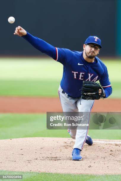 Dane Dunning of the Texas Rangers pitches against the Cleveland Guardians during the first inning at Progressive Field on September 16, 2023 in...