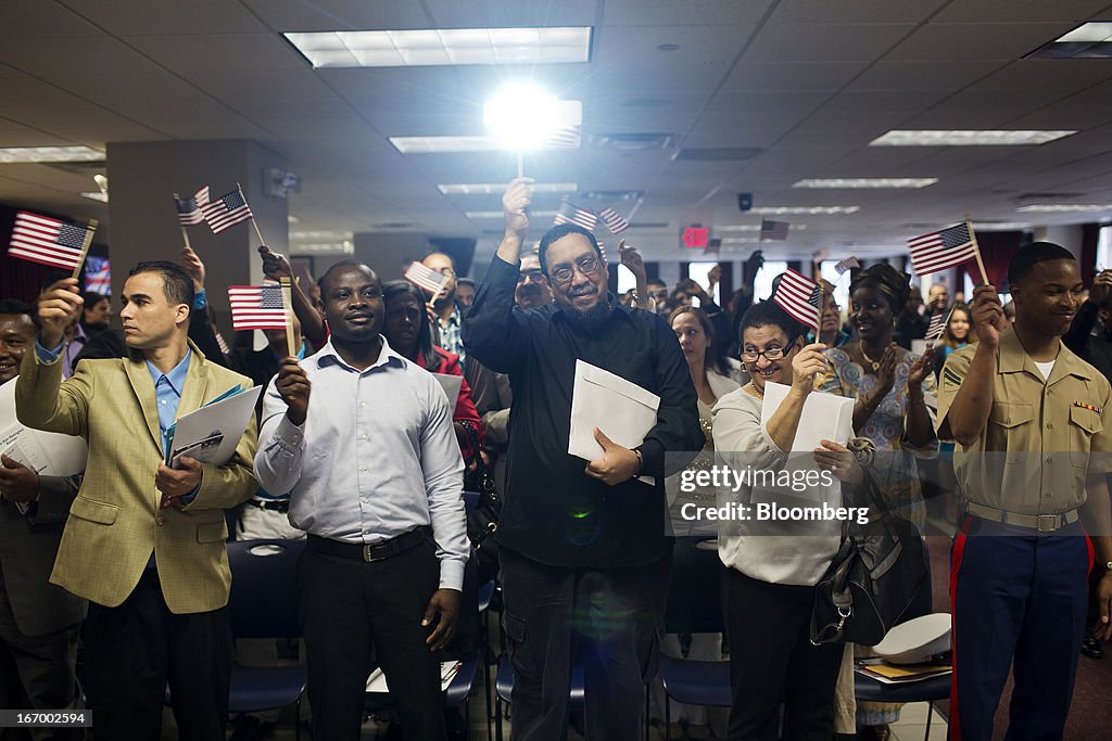 Views From A U.S. Naturalization Ceremony As Immigration Plan Critics Call Its Citizenship Path 'Amnesty'