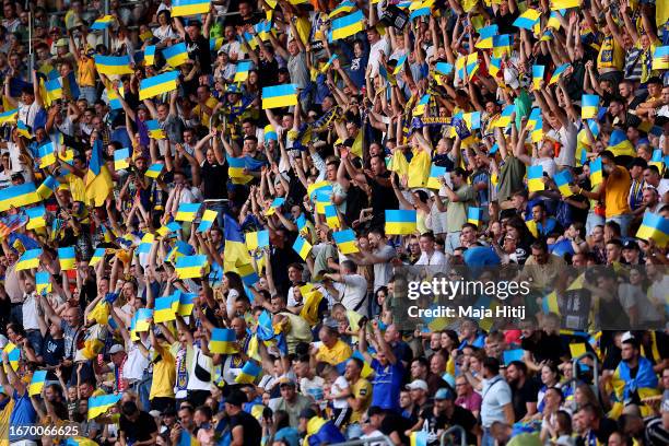 Fans of Ukraine show their support during the UEFA EURO 2024 European qualifier match between Ukraine and England at Stadion Wroclaw on September 09,...