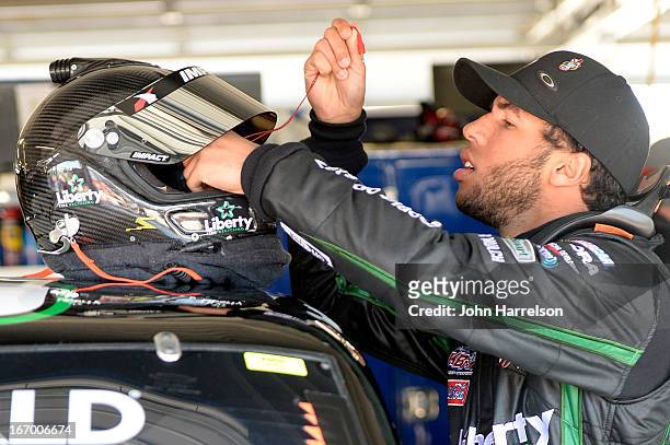 Darrell Wallace Jr., driver of the LibertyTireRecycling/Ground SmartRubber Toyota, prepares to drive during practice for the NASCAR Camping World...