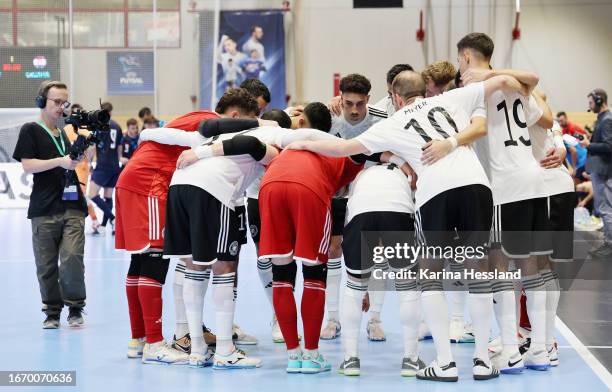 Team circle of Germany during the Futsal World Championship Qualifier between Germany and Croatia at Richard-Hartmann-Halle on September 16, 2023 in...