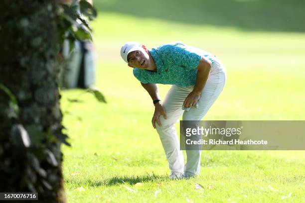 Rory McIlroy of Northern Ireland plays around a tree on the 2nd during Day Three of the Horizon Irish Open at The K Club on September 09, 2023 in...