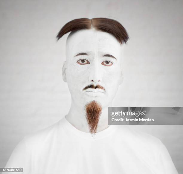 bizarre white painted man portrait - frozen beard stock pictures, royalty-free photos & images