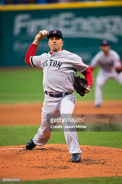 Starting pitcher Alfredo Aceves of the Boston Red Sox pitches during the game against the Cleveland Indians at Progressive Field on April 17, 2013 in...