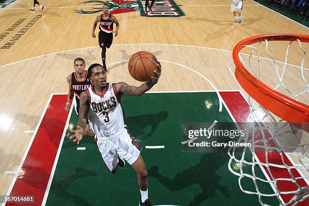 Brandon Jennings of the Milwaukee Bucks glides to the basket against the Portland Trail Blazers on March 19, 2013 at the BMO Harris Bradley Center in...