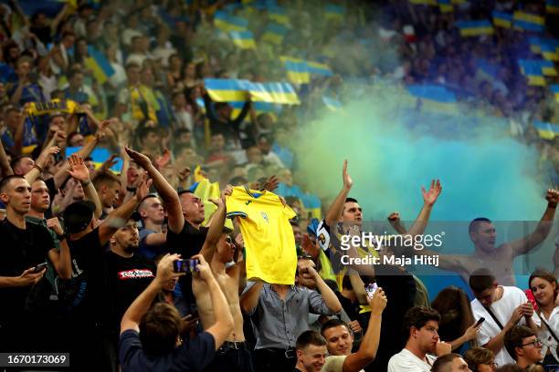 Fans of Ukraine show their support following the UEFA EURO 2024 European qualifier match between Ukraine and England at Stadion Wroclaw on September...