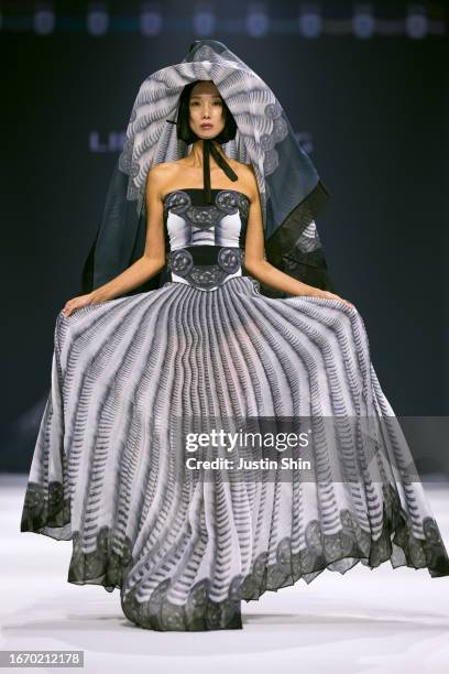 Model walks the runway during the LIE SANGBONG show at Seoul Fashion Week S/S 2024 on September 09, 2023 in Seoul, South Korea.