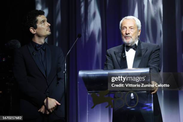 President of the international juries Damien Chazelle and President of the Venice Biennale Roberto Cicutto on stage during the Awards ceremony at the...