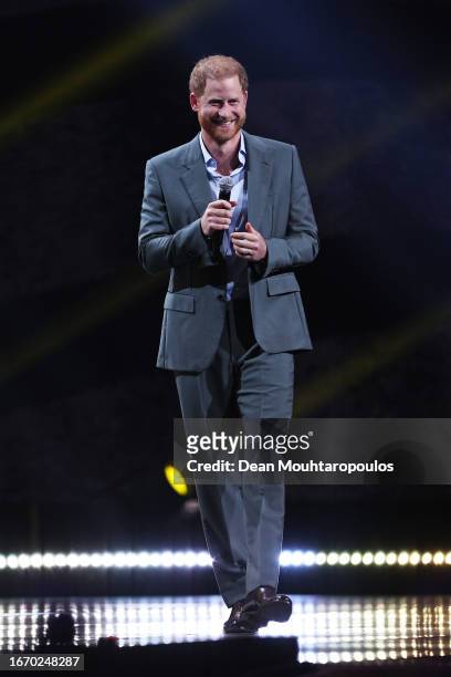 Prince Harry, Duke of Sussex talks on stage during the opening ceremony of the Invictus Games Düsseldorf 2023 at Merkur Spiel-Arena on September 09,...
