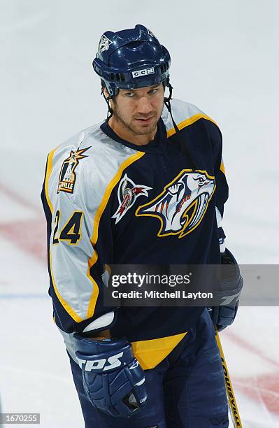 Right wing Scott Walker of the Nashville Predators looks on during warmups before the game against the Washington Capitals on October 11, 2002 at the...