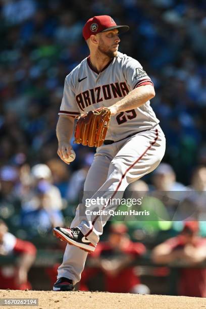 Starting pitcher Merrill Kelly of the Arizona Diamondbacks pitches in the first inning against the Chicago Cubs at Wrigley Field on September 09,...