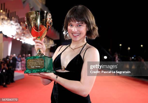 Cailee Spaeny poses with the Volpi Cup for Best Actress Award for ‘Priscilla’ at the winner's photocall at the 80th Venice International Film...