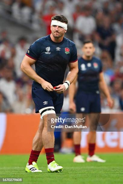 Tom Curry of England leaves the field after receiving a yellow card from Referee Mathieu Roger Jean Raynal as a 8-Minute window for a TMO Bunker...