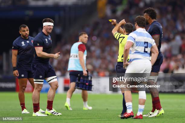 Tom Curry of England leaves the field after receiving a yellow card from Referee Mathieu Roger Jean Raynal as a 8-Minute window for a TMO Bunker...