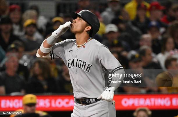 Oswaldo Cabrera of the New York Yankees reacts as he rounds the bases after hitting a solo home run in the eighth inning during the game against the...