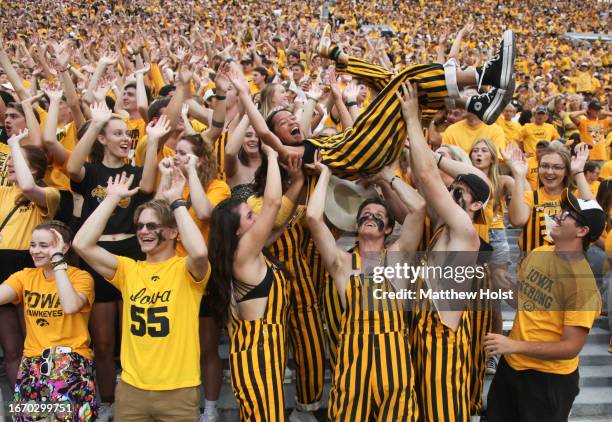 Fans cheer during the second half of the match-up between the Iowa Hawkeyes and the Western Michigan Broncos at Kinnick Stadium on September 16, 2023...