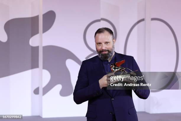Yorgos Lanthimos poses with the Golden Lion for Best Film for 'Poor Things' at the winner's photocall at the 80th Venice International Film Festival...