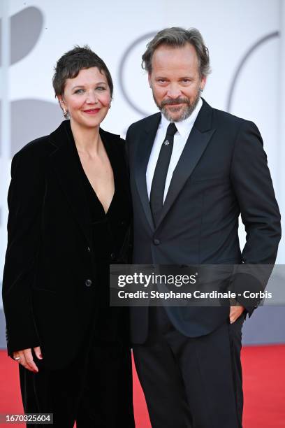 Maggie Gyllenhaal and Peter Sarsgaard attend a red carpet ahead of the closing ceremony at the 80th Venice International Film Festival on September...