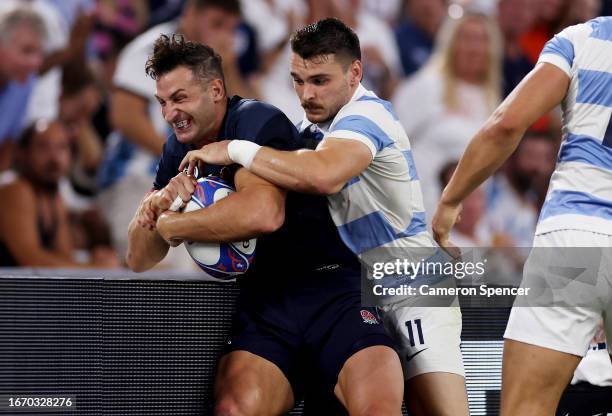 Jonny May of England clashes with Mateo Carreras of Argentina during the Rugby World Cup France 2023 match between England and Argentina at Stade...