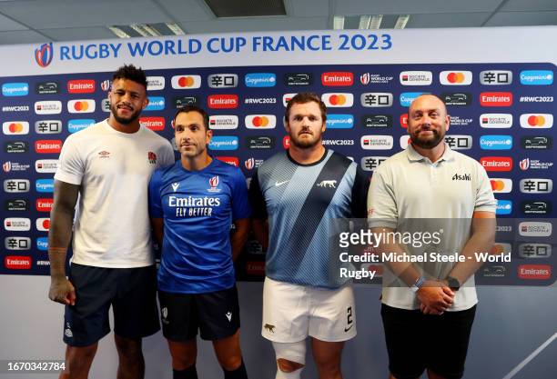 Captains Courtney Lawes of England and Jamie George of England pose for a photograph with Referee Mathieu Raynal and Jarryd Harris, also known as...