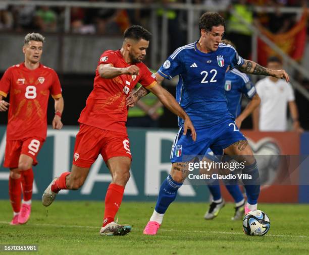 Nicolo Zaniolo of Italy competes for the ball with Visar Musliu of North Macedonia during the UEFA EURO 2024 European qualifier match between North...