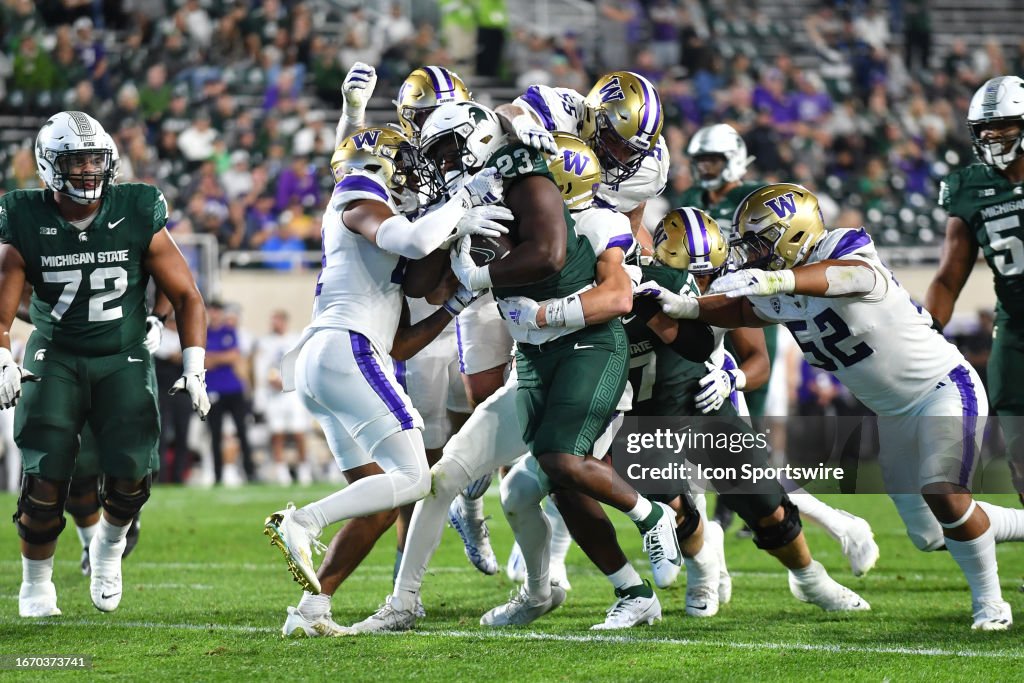 Adam Ruff Michigan State Spartans tight end Tyneil Hopper drags four Washington ...