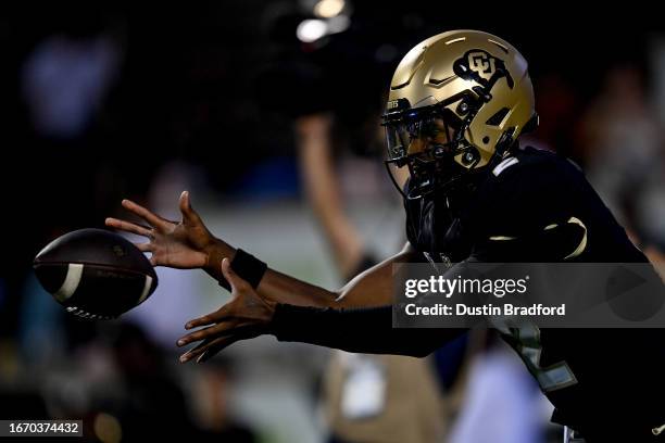 Quarterback Shedeur Sanders of the Colorado Buffaloes warms up before a game against the Colorado State Rams at Folsom Field on September 16, 2023 in...