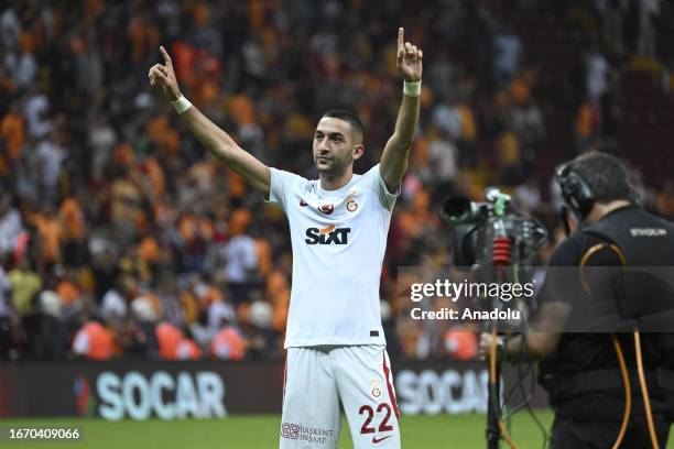 Hakim Ziyech of Galatasaray greets the fans at the end of the Turkish Super Lig week 5 football match between Galatasaray and Yilport Samsunspor at...