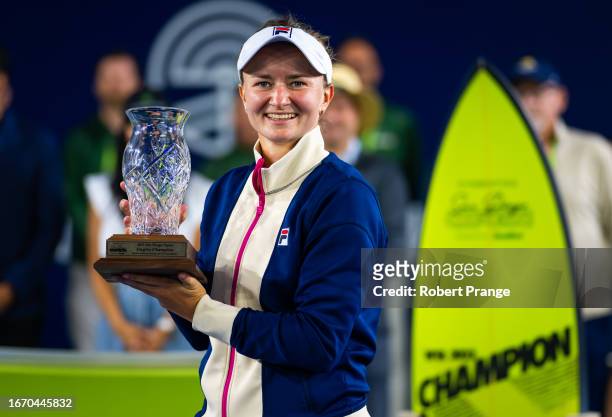 Barbora Krejcikova of the Czech Republic poses with the champions trophy after defeating Sofia Kenin of the United States in the singles final on Day...