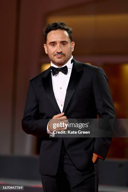 Director Juan Antonio Bayona attends a red carpet for the Netflix movie "The Society Of The Snow" at the 80th Venice International Film Festival on...