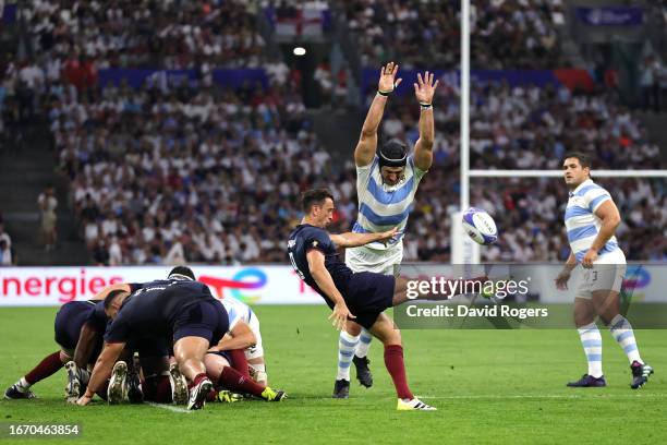 Alex Mitchell of England kicks the ball upfield directly from the ruck during the Rugby World Cup France 2023 match between England and Argentina at...