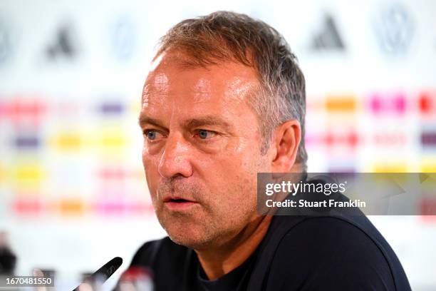 Hansi Flick, Head Coach of Germany, speaks to the media in the post match press conference following the international friendly match between Germany...