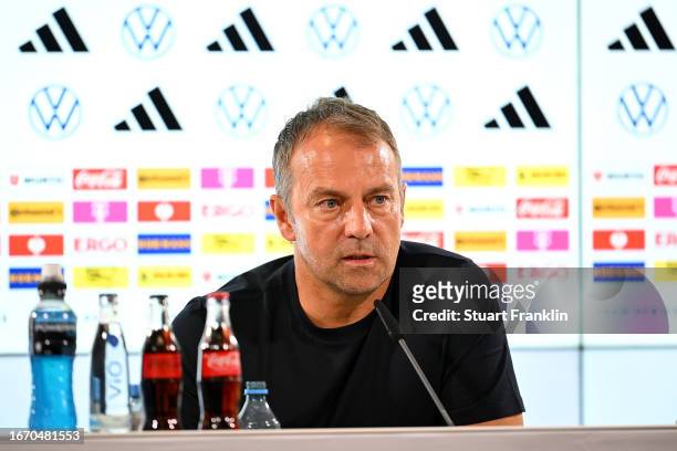 Hansi Flick, Head Coach of Germany, speaks to the media in the post match press conference following the international friendly match between Germany...