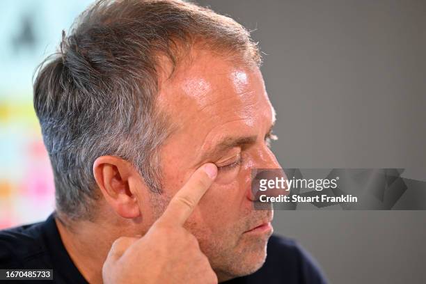 Hansi Flick, Head Coach of Germany, speaks to the media in the post match press conference following the international friendly match between Germany...