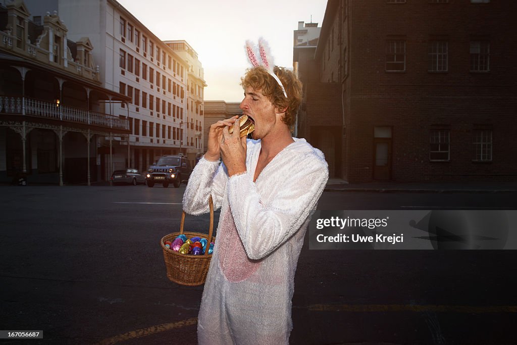 Easter Bunny eating burger