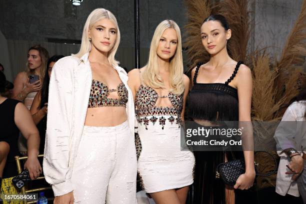 Devon Windsor, Nadine Leopold and Gabby Westbrook-Patrick attend the PatBO fashion show during New York Fashion Week - September 2023 on September...