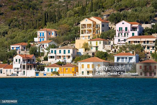 colourful houses, vathy, ithaca, greece - ithaca stock pictures, royalty-free photos & images