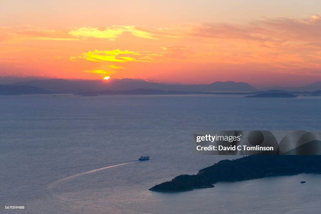 Ferry leaving port at dawn, Vathy, Ithaca, Greece