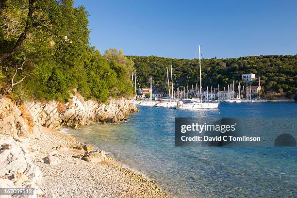 sheltered cove, kioni, ithaca, greece - ithaca stock pictures, royalty-free photos & images