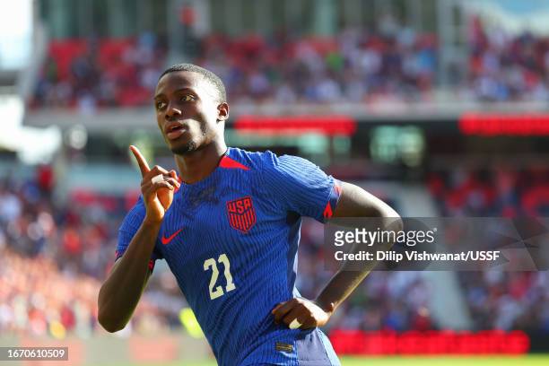 Tim Weah of the United States celebrates scoring during the first half of a match between Uzbekistan and the United States at CITYPARK on September...