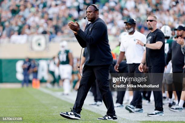 Head coach Mel Tucker of the Michigan State Spartans reacts after a touchdown in the third quarter of a game against the Richmond Spiders at Spartan...