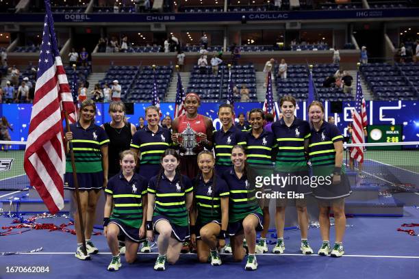 Coco Gauff of the United States poses for a photo with the ball girls after she defeated Aryna Sabalenka of Belarus in their Women's Singles Final...