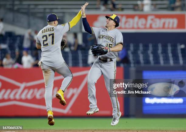 Willy Adames and Tyrone Taylor of the Milwaukee Brewers celebrate after defeating the New York Yankees at Yankee Stadium on September 9, 2023 in the...