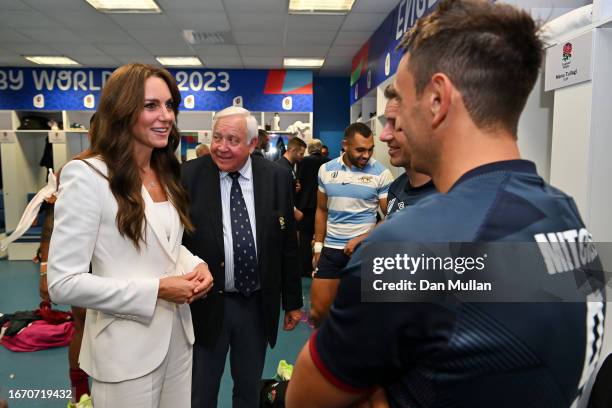 Catherine, Princess of Wales and Patron of the England Rugby Football Union Alex Mitchell of England following his side's victory in the Rugby World...