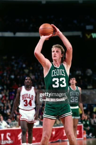 Larry Bird of the Boston Celtics takes a free-throw during the 1980 NBA game against the Chicago Bulls at Chicago Stadium in Chicago, Illinois. NOTE...