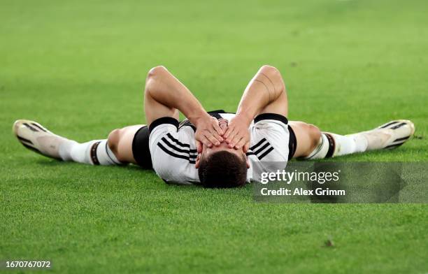 Robin Gosens of Germany reacts during the international friendly match between Germany and Japan at Volkswagen Arena on September 09, 2023 in...