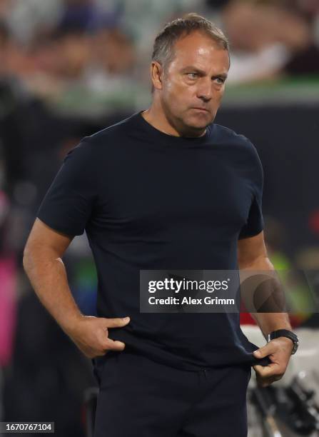Head coach Hans-Dieter Flick of Germany reacts during the international friendly match between Germany and Japan at Volkswagen Arena on September 09,...