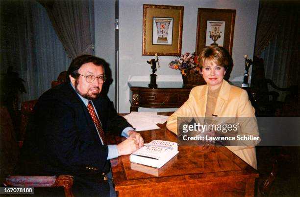 Portrait of American photographer and author Lawrence Schiller and journalist and news anchor Jane Pauley during an interview, New York, New York,...