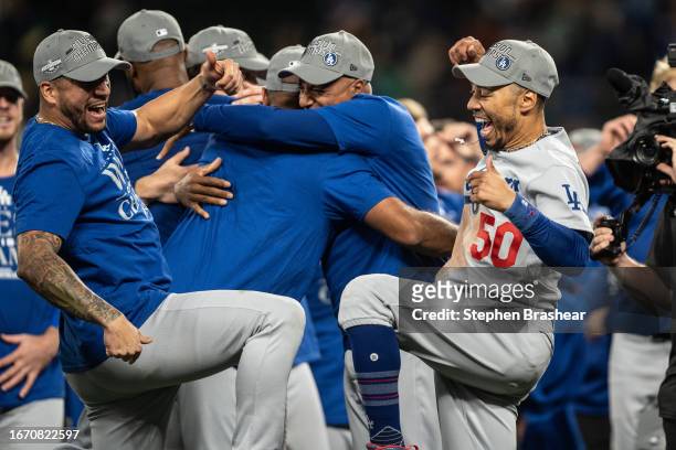 Los Angeles Dodgers including Mookie Betts celebrate after a game against the Seattle Mariners in which the team clinched the National League West...